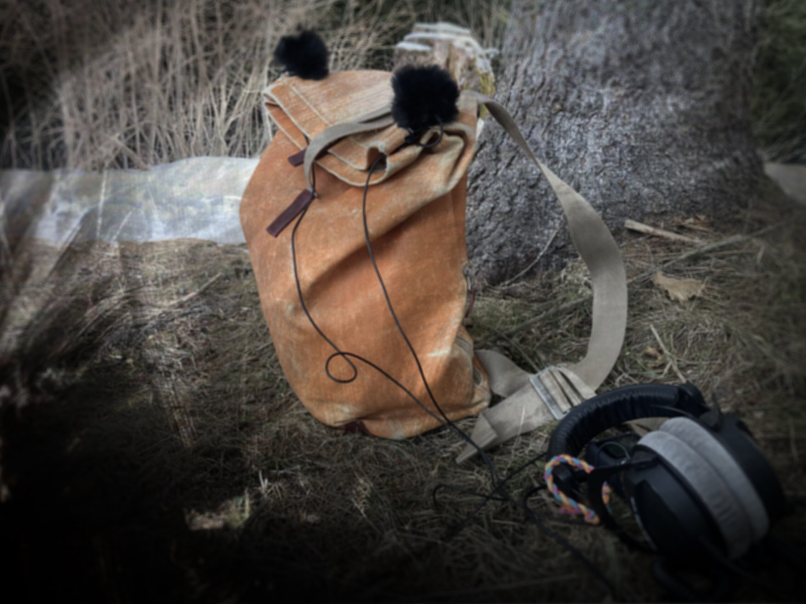 Rucksack with microphones and headphones